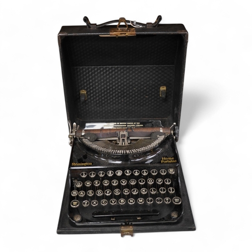 1268 - A cased Remington Home Portable typewriter. Condition - fair.