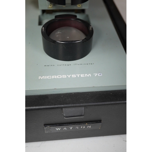 1269 - Three mid twentieth century microscopes; a Leica BM E binocular microscope, a Watson Microsystem 70 ... 