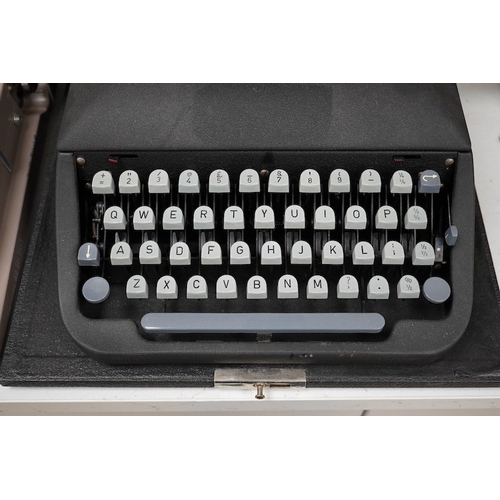 1270 - Three cased typewriters; a German Gossen Tippa, a Remington Travel-Riter and a German (U.S. Zone) Bl... 