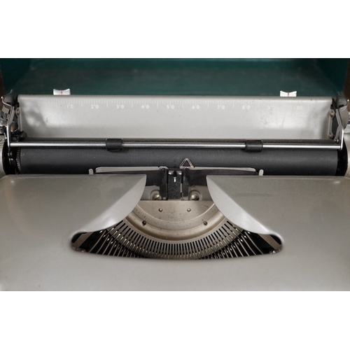 1270 - Three cased typewriters; a German Gossen Tippa, a Remington Travel-Riter and a German (U.S. Zone) Bl... 