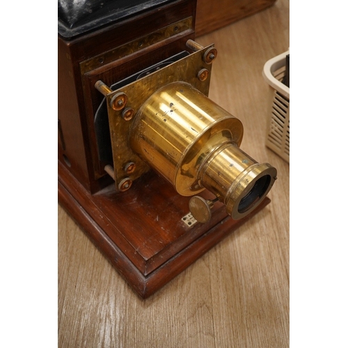 1273 - A mahogany and brass magic lantern in pine box, and a quantity of magic lantern slides by Primus, et... 