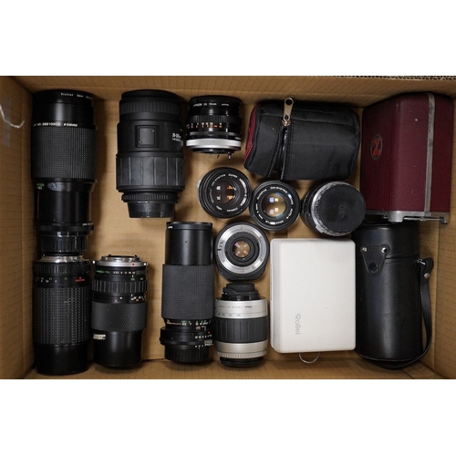 1275 - Eight SLR and DSLR camera bodies by Nikon, Zenit-E, Fujifilm, Canon, etc., together with thirteen le... 