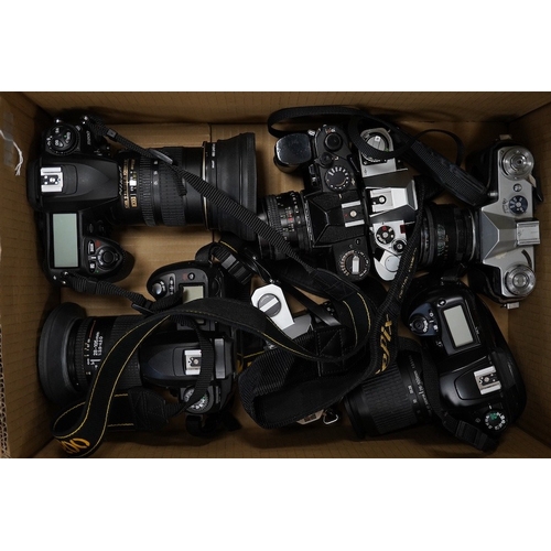 1275 - Eight SLR and DSLR camera bodies by Nikon, Zenit-E, Fujifilm, Canon, etc., together with thirteen le... 