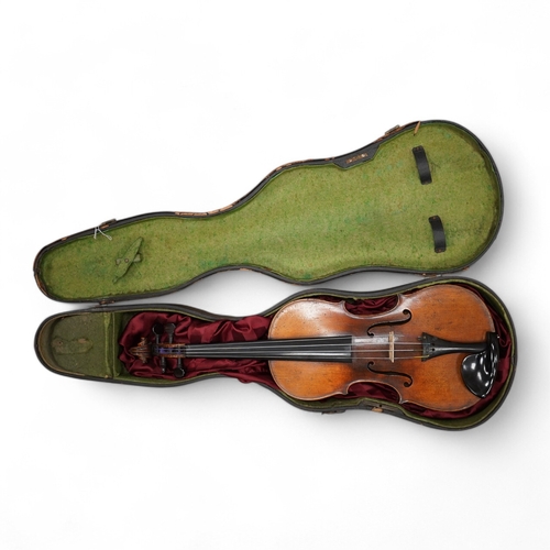 1286 - A late 19th century German violin from the Mittenwald region, body length 36cm, in a contemporary ca... 