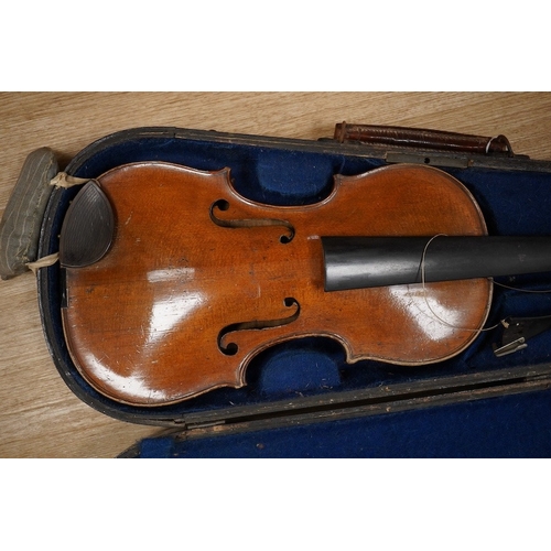 1287 - Two cased violins; one French 19th century bearing a hand written label for Francesco Werentle 1746,... 