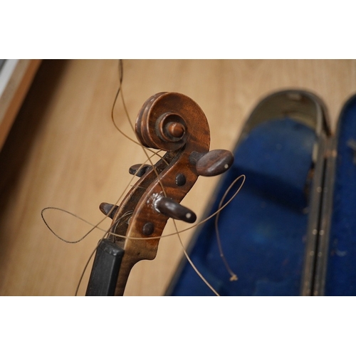 1287 - Two cased violins; one French 19th century bearing a hand written label for Francesco Werentle 1746,... 