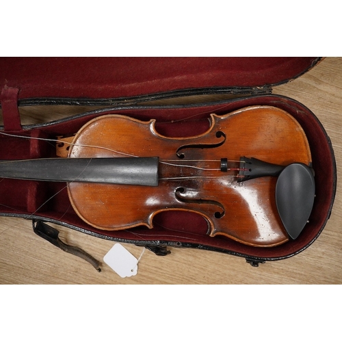 1287 - Two cased violins; one French 19th century bearing a hand written label for Francesco Werentle 1746,... 