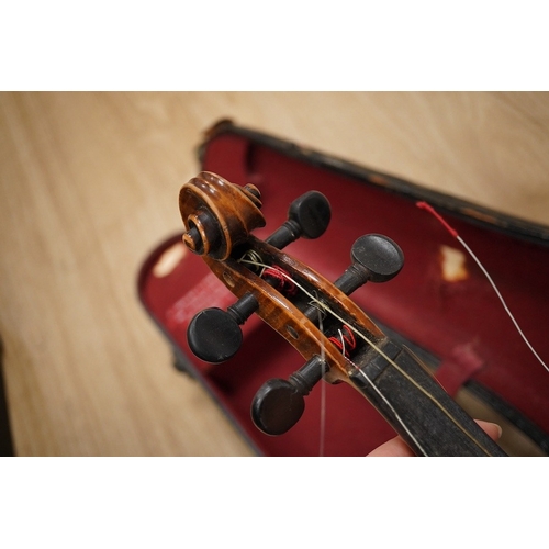 1287 - Two cased violins; one French 19th century bearing a hand written label for Francesco Werentle 1746,... 