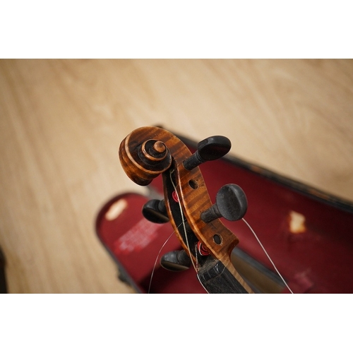 1287 - Two cased violins; one French 19th century bearing a hand written label for Francesco Werentle 1746,... 