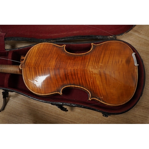 1287 - Two cased violins; one French 19th century bearing a hand written label for Francesco Werentle 1746,... 