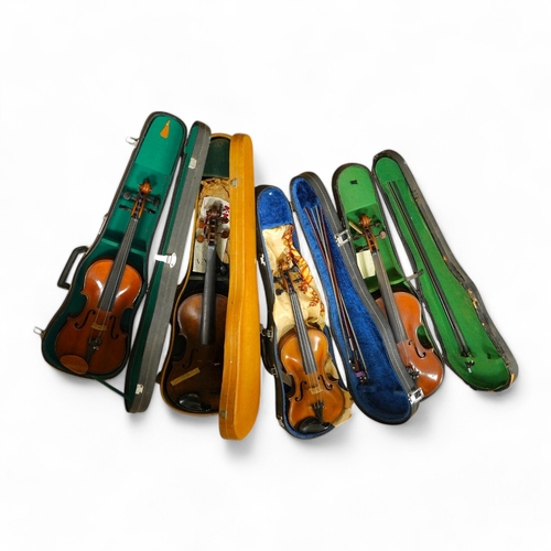 1289 - Four cased violins; an early 20th century violin, body 36cm, fitted with a microphone pick up taking... 