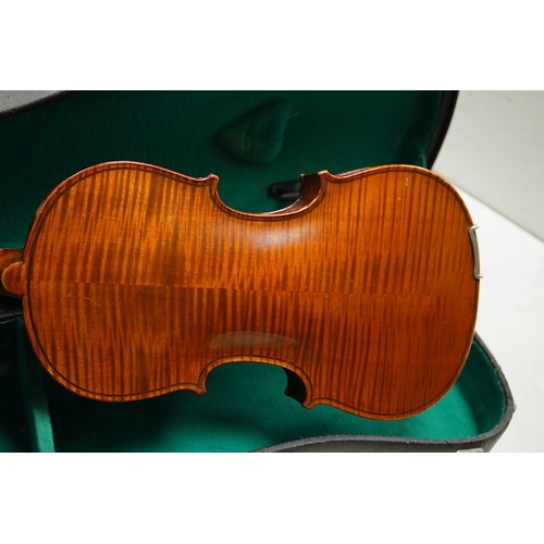 1289 - Four cased violins; an early 20th century violin, body 36cm, fitted with a microphone pick up taking... 