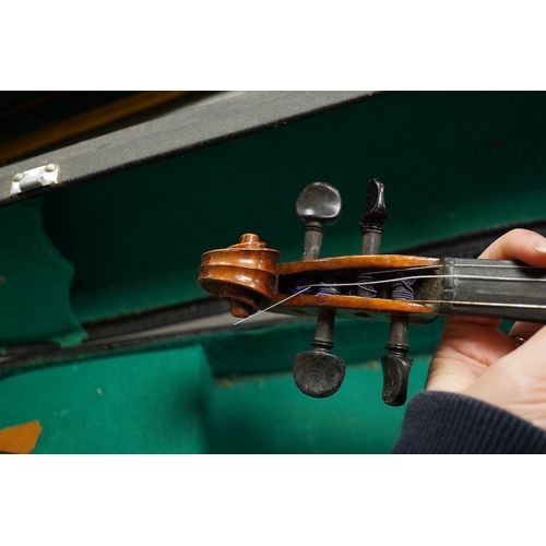 1289 - Four cased violins; an early 20th century violin, body 36cm, fitted with a microphone pick up taking... 