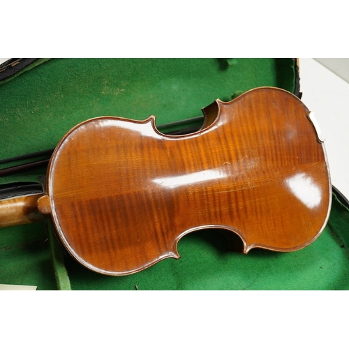 1289 - Four cased violins; an early 20th century violin, body 36cm, fitted with a microphone pick up taking... 