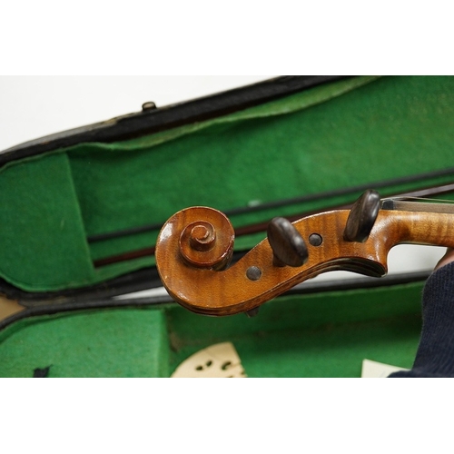 1289 - Four cased violins; an early 20th century violin, body 36cm, fitted with a microphone pick up taking... 