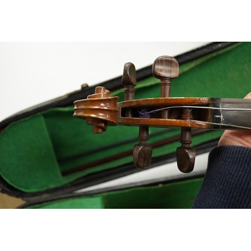 1289 - Four cased violins; an early 20th century violin, body 36cm, fitted with a microphone pick up taking... 