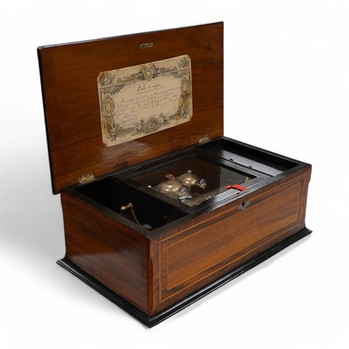 1295 - A 19th century Swiss cylinder music box, in a walnut and kingwood cross banded case, with 43 tooth c... 