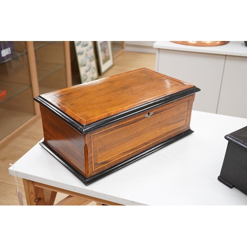 1295 - A 19th century Swiss cylinder music box, in a walnut and kingwood cross banded case, with 43 tooth c... 