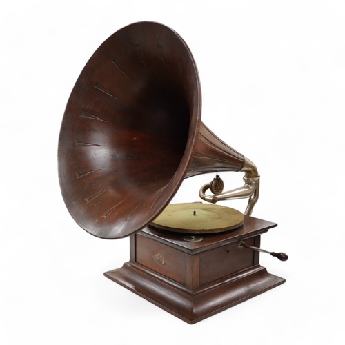 1298 - An HMV tabletop mahogany gramophone player with large laminated wooden horn, diameter of horn 55cm. ... 