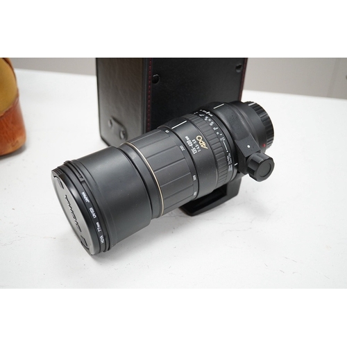 1299 - A quantity of photographic equipment to include Tokina AF 20-35 lens, Sigma 135-400 lens, Minolta Dy... 