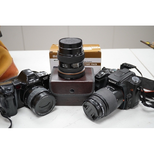 1299 - A quantity of photographic equipment to include Tokina AF 20-35 lens, Sigma 135-400 lens, Minolta Dy... 