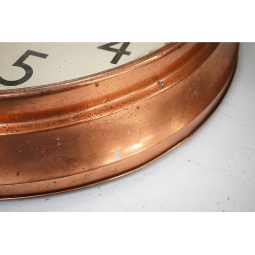 1332 - A copper Magneta Electric wall clock, with Arabic dial 53cm in diameter. Condition - fair/good, unte... 