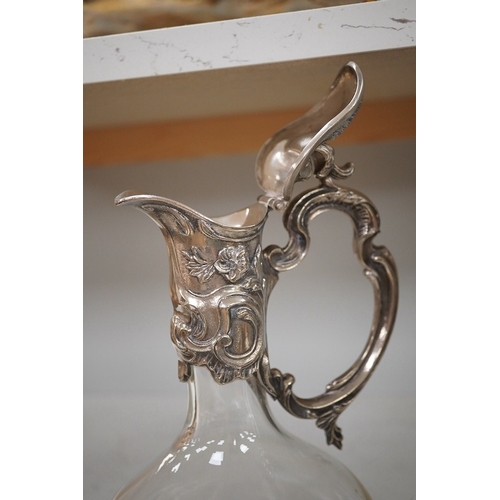 1334 - A pair of Art Nouveau style glass and silver plate mounted claret jugs, 31cm. Condition - good... 