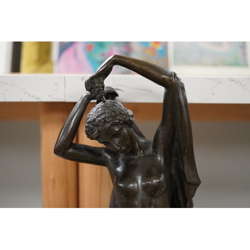 1340 - A 20th century bronze figure of a maiden, raised on marble socle, 38.5cm. Condition - fair to good... 