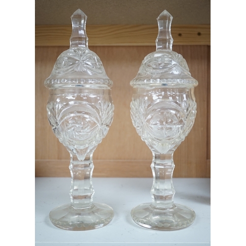 1342 - A pair of Bohemian glass sweetmeat vases and covers, 31cm. Condition - fair