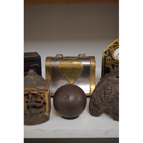 1345 - Six various metalware money boxes to include a cannonball money box, a safe money box, a George ... 