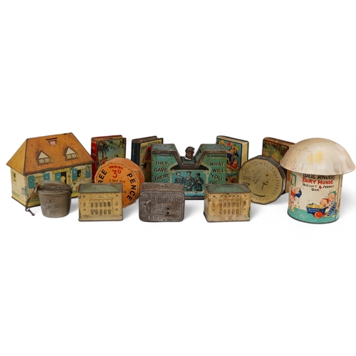 1352 - A quantity of various painted tin money boxes including Lucie Attwell Fairy House, The Daily Mail ... 