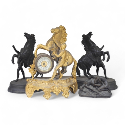 1355 - Two Spelter Marley horse groups, a similar timepiece and a bronzed resin erotic figure group after J... 