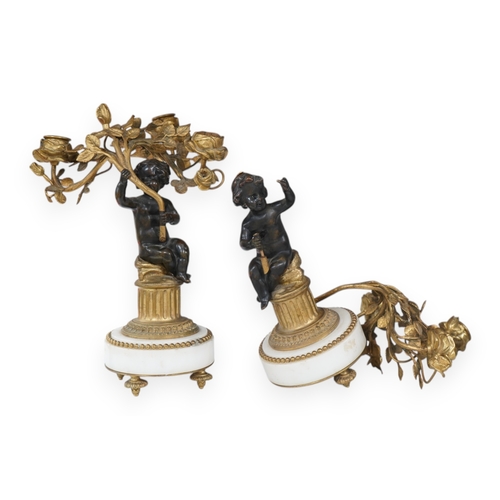 1368 - A pair of Louis XVI style bronze, ormolu and white marble figural candelabra, late 19th century, 28c... 