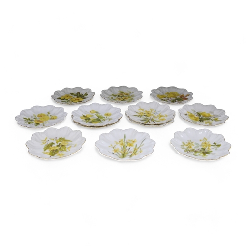 1385 - Twelve Limoges floral decorated plates possibly from a dessert service. 23cm diameter. Condition - s... 