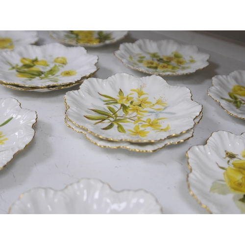 1385 - Twelve Limoges floral decorated plates possibly from a dessert service. 23cm diameter. Condition - s... 