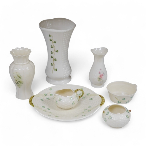 1386 - A Belleek serving plate, milk jug and two bowls and three Donegal vases, tallest item 25cm high. Con... 