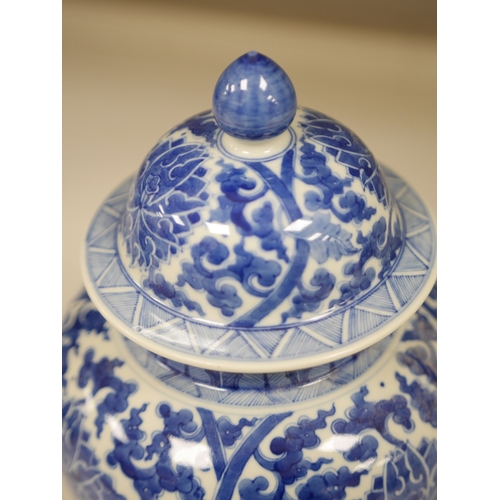 1387 - A Chinese blue and white baluster vase and cover, 32cm high. Condition - good