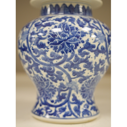 1387 - A Chinese blue and white baluster vase and cover, 32cm high. Condition - good