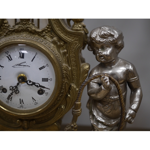 1406 - An ornate mixed metal putti clock and five light garniture, garnitures 59.5cm high. Condition - fair... 