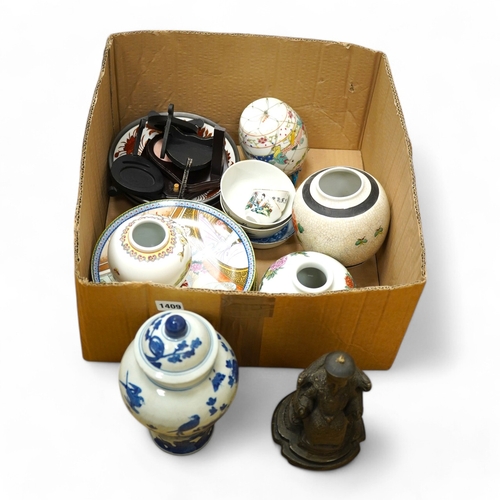 1409 - A mixed collection of oriental vases, jars, plates etc and a resin  Deity,  Chinese blue and white v... 