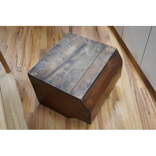 1411 - An early 20th century oak dog basket, 65cm wide. Condition - fair