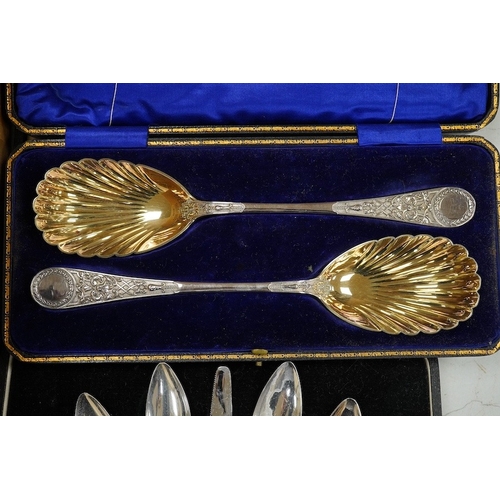 1413 - A cased set of six silver grapefruits spoons with a silver handled carving knife and a quantity of a... 