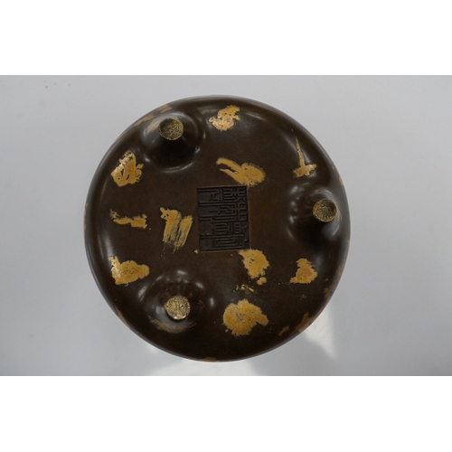 1419 - A Chinese gold splash bronze censer, Xuande seal mark to underside, 11cm wide. Condition - good... 