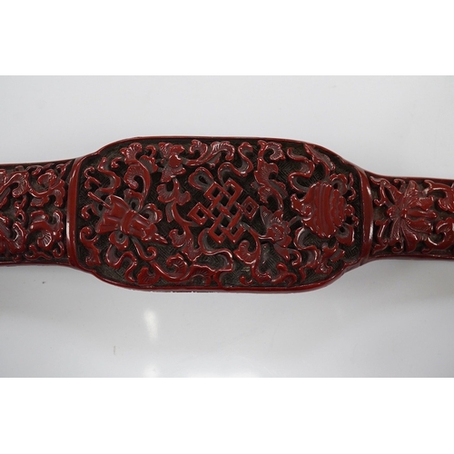 1420 - A Chinese red lacquered Ruyi sceptre, 41cm. Condition - fair to good