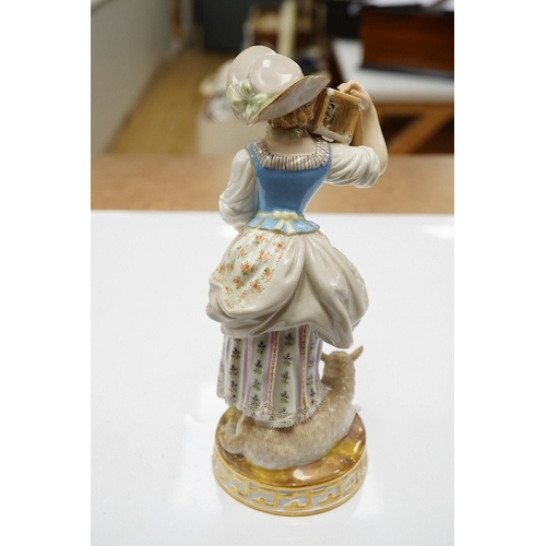 1424 - A 19th century Meissen figure of a shepherdess with a birdcage, incised F73, 18cm. Condition - fair... 