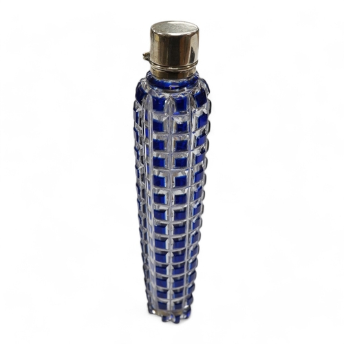 1437 - A 19th century blue overlay glass scent bottle with square ribbed design, 12cm long. Condition - goo... 