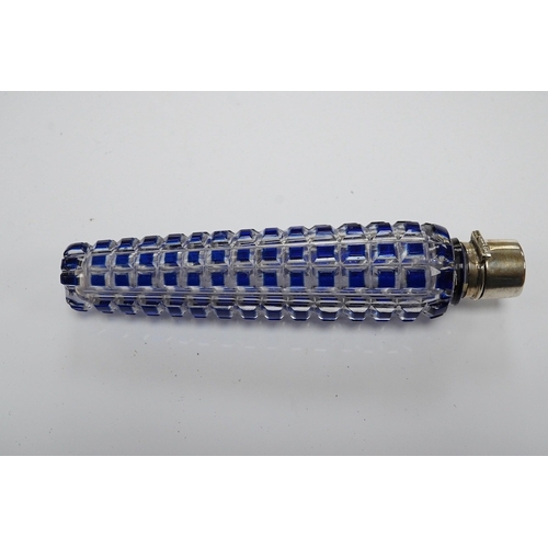 1437 - A 19th century blue overlay glass scent bottle with square ribbed design, 12cm long. Condition - goo... 