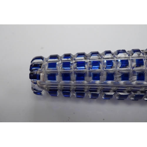 1437 - A 19th century blue overlay glass scent bottle with square ribbed design, 12cm long. Condition - goo... 