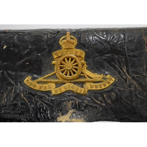 1438 - A Victorian Royal Artillery leather and brass cartridge pouch, 15cm wide. Condition - fair