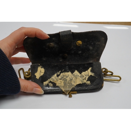 1438 - A Victorian Royal Artillery leather and brass cartridge pouch, 15cm wide. Condition - fair